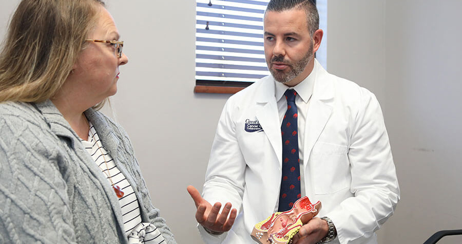 Physician talking to patient